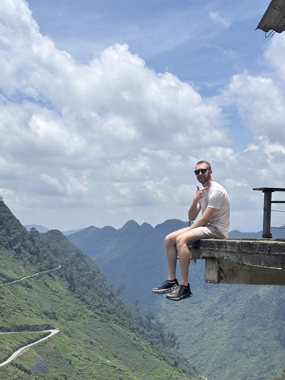 Noah on a ledge over a valley